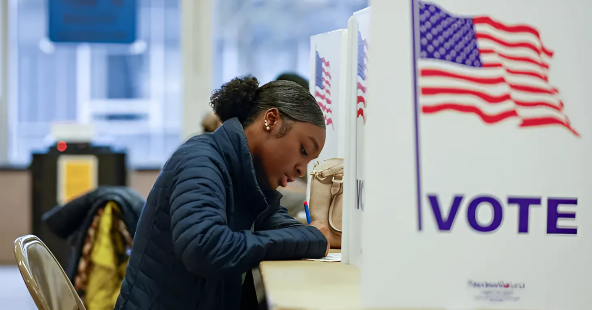 A voter fills out her ballot for the U.S. presidential election. 

Image Source: Al Jazeera 